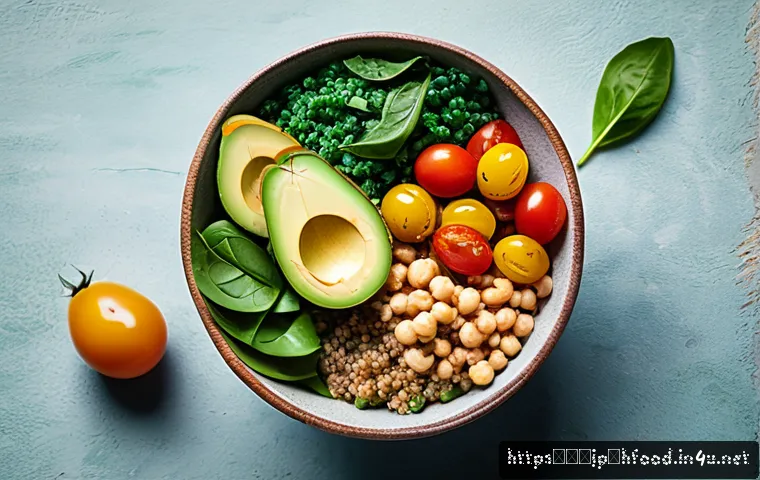 집에서 간편하게 만드는 비건 요리 - A vibrant vegan bowl featuring a colorful arrangement of fresh vegetables such as ripe avocado slice...